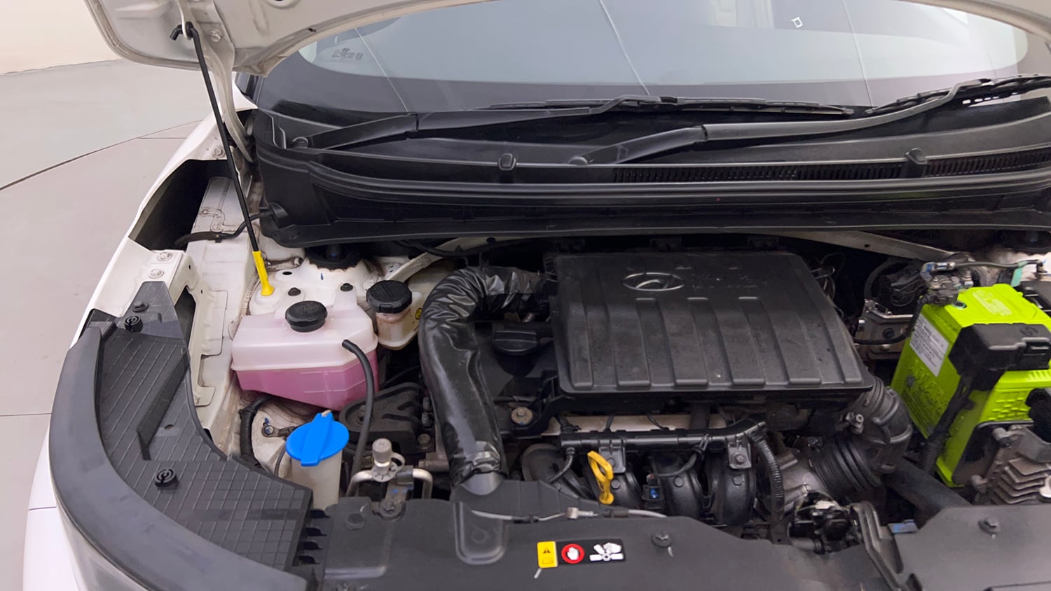Used 2023 Hyundai Exter SX (O) Connect 1.2 AMT Petrol Automatic engine ENGINE RIGHT SIDE HINGE & APRON VIEW
