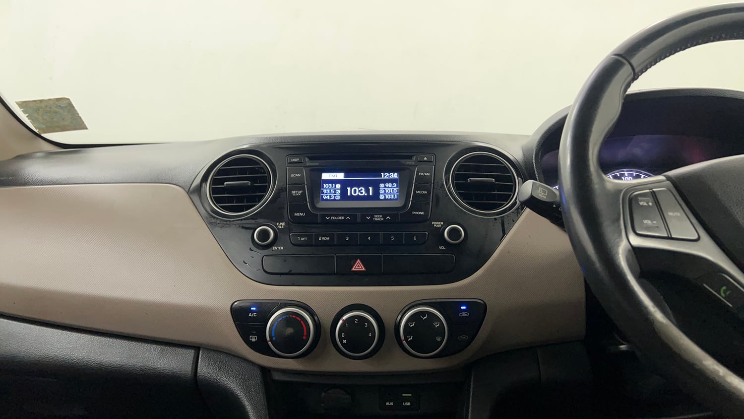 Used 2015 Hyundai Grand i10 Asta 1.2 Kappa VTVT Petrol Manual interior MUSIC SYSTEM & AC CONTROL VIEW