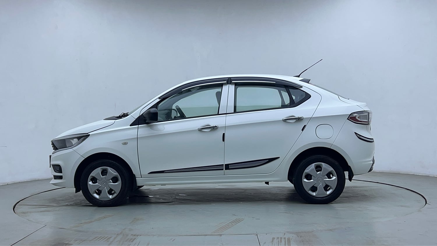 Used 2024 Tata Tigor XM Petrol Manual exterior LEFT SIDE VIEW