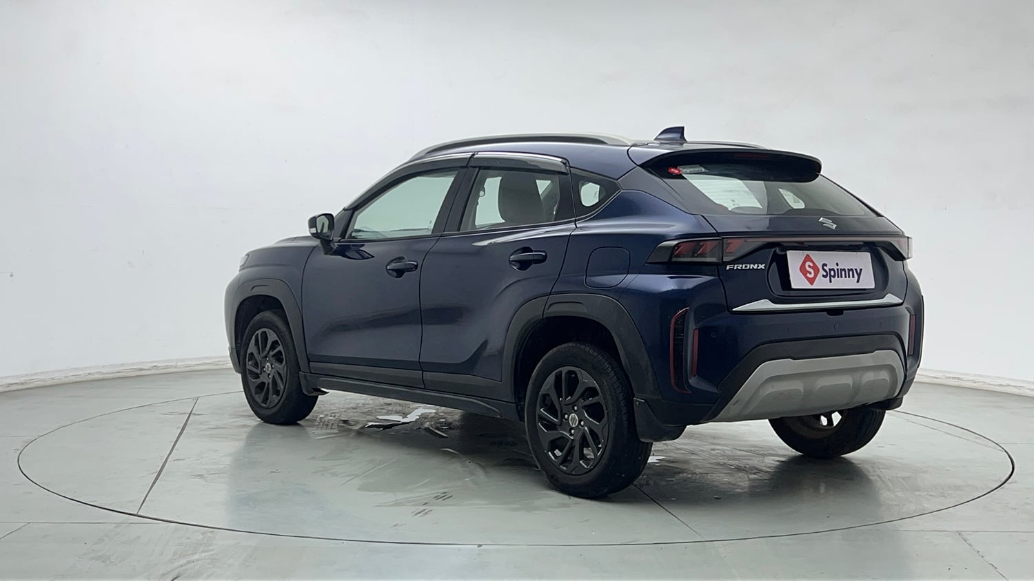 Used 2023 Maruti Suzuki Fronx Delta Plus 1.2L MT Petrol Manual exterior LEFT REAR CORNER VIEW