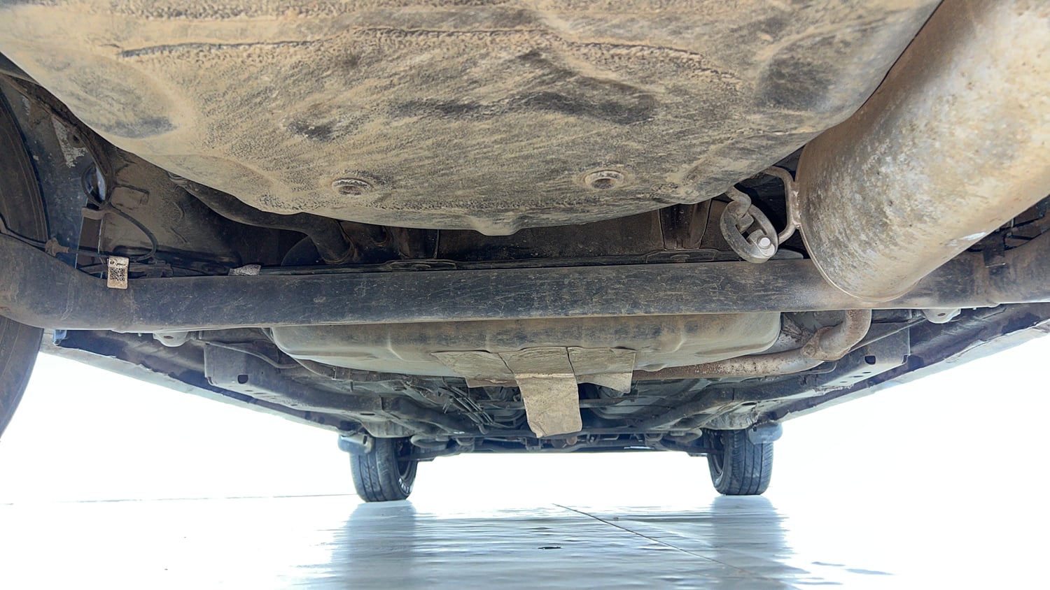 Used 2024 Tata Tigor XM Petrol Manual extra REAR UNDERBODY VIEW (TAKEN FROM REAR)