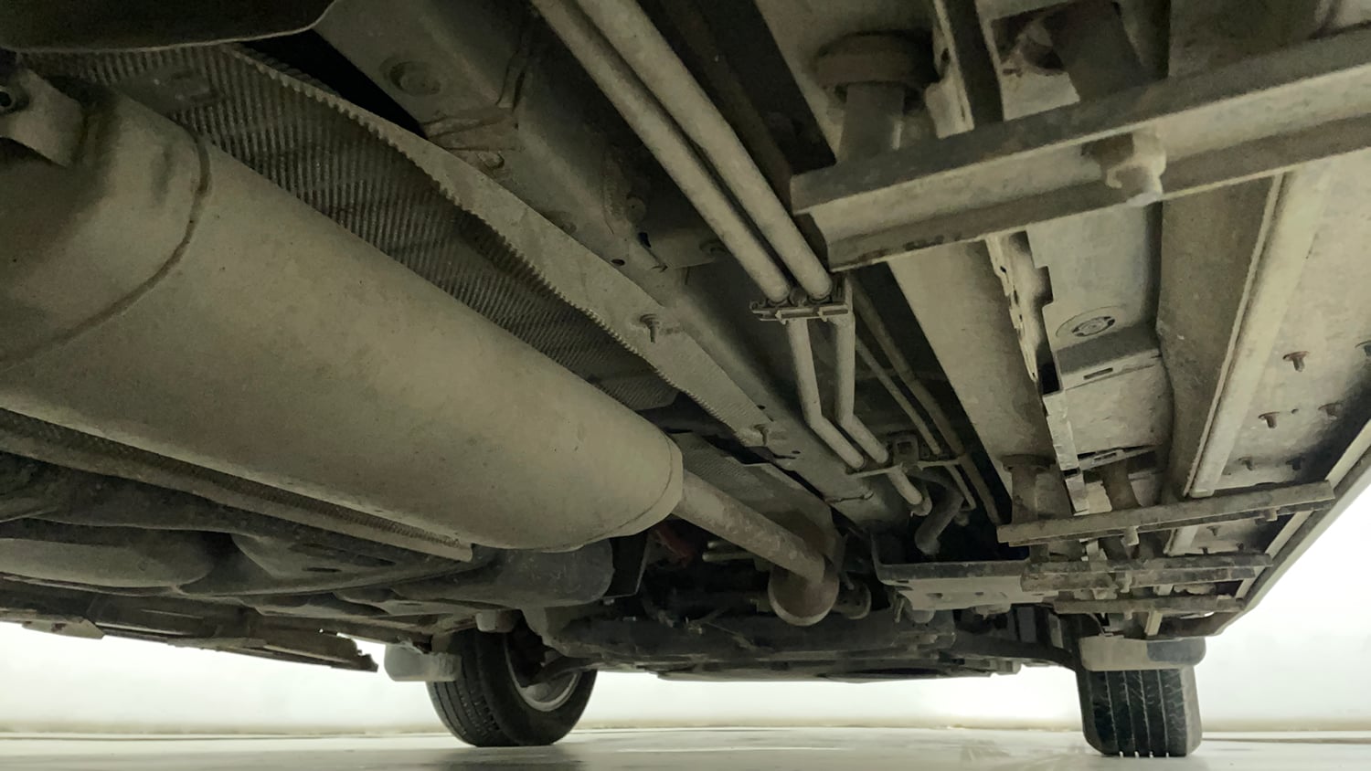 Used 2024 Maruti Suzuki Invicto Alpha Plus 7 STR Hybrid Automatic extra REAR RIGHT UNDERBODY VIEW