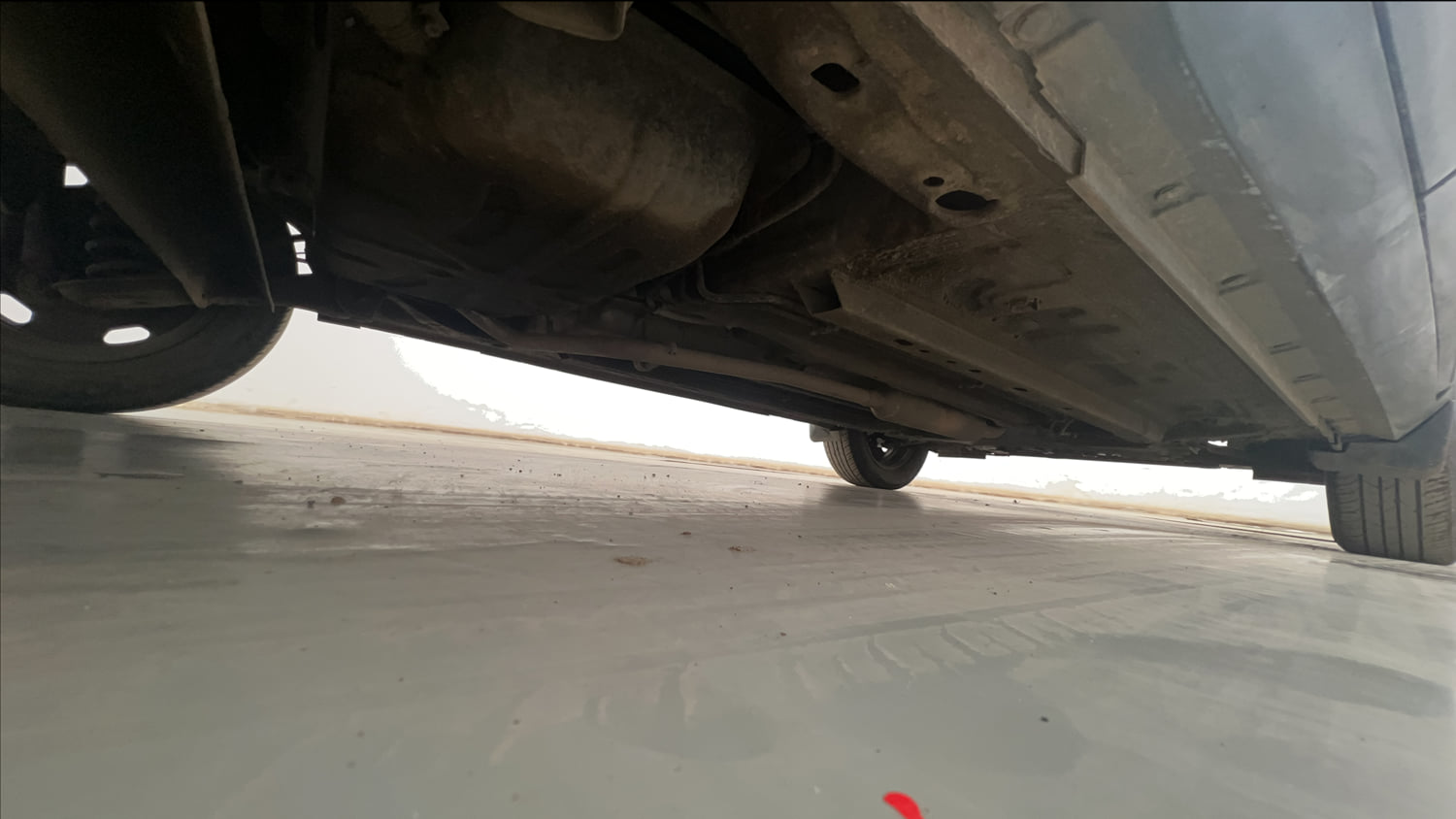 Used 2023 Nissan Magnite XE Petrol Manual extra REAR RIGHT UNDERBODY VIEW