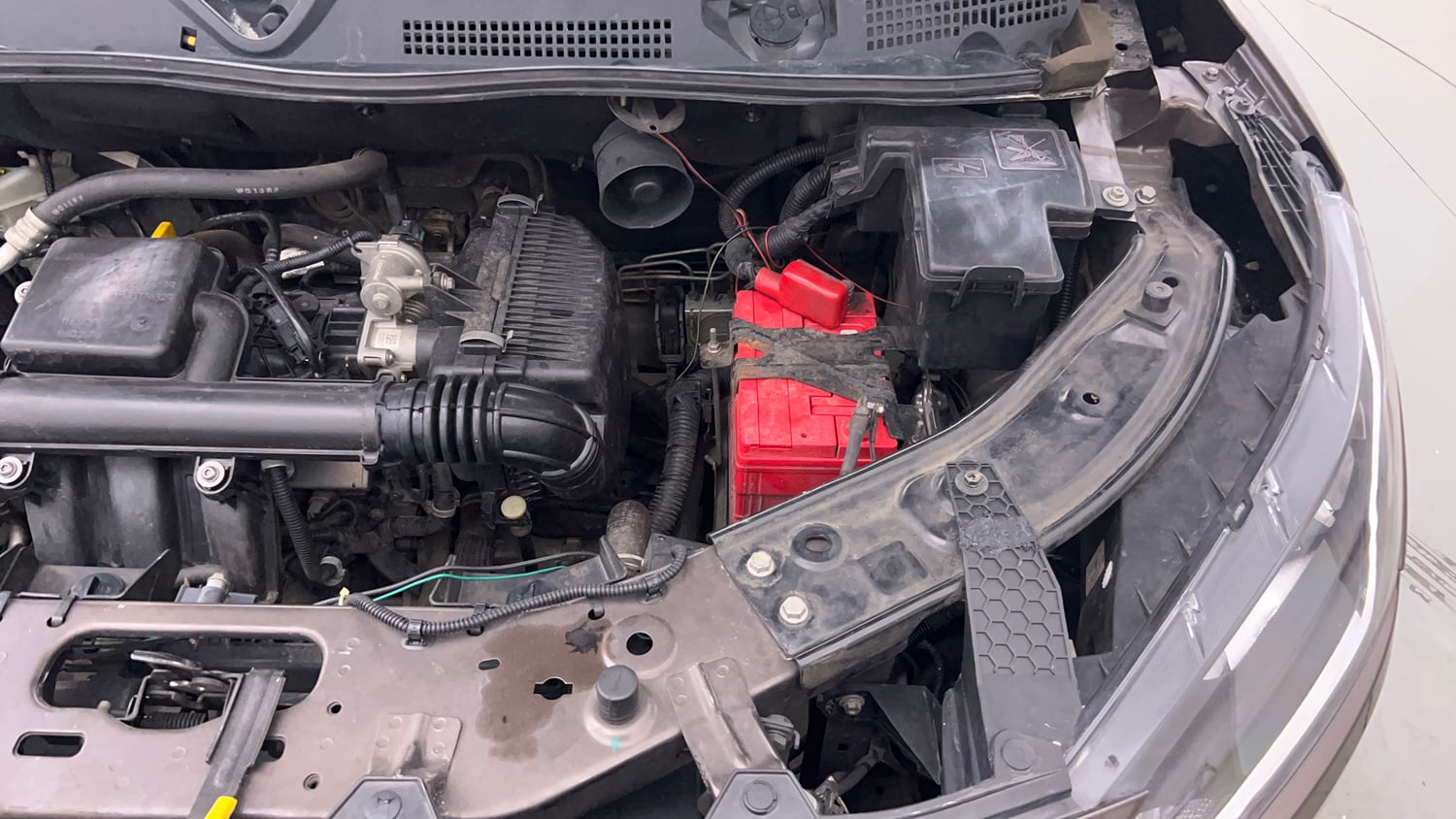 Used 2023 Nissan Magnite XE Petrol Manual engine ENGINE LEFT SIDE VIEW