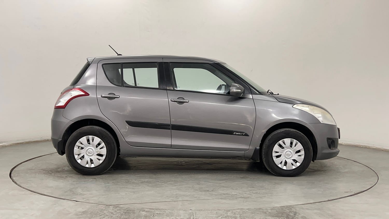 Used 2014 Maruti Suzuki Swift VXi Petrol Manual exterior RIGHT SIDE VIEW
