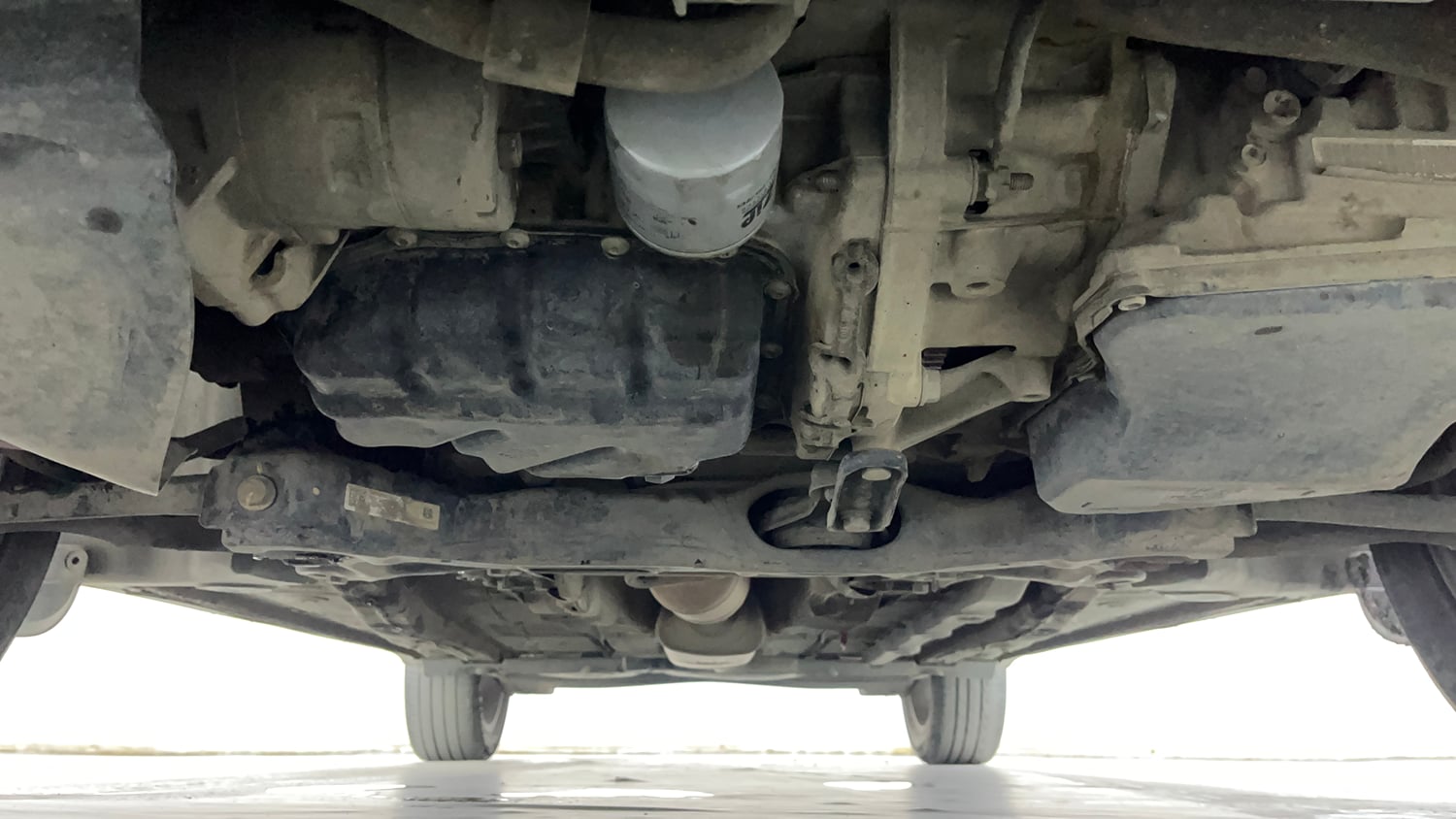 Used 2022 Volkswagen Taigun Topline 1.0 TSI AT Petrol Automatic extra FRONT LEFT UNDERBODY VIEW