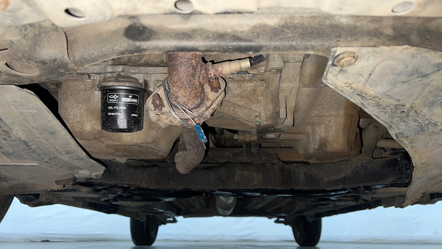 Used 2017 Maruti Suzuki Swift Lxi (O) Petrol Manual extra FRONT LEFT UNDERBODY VIEW