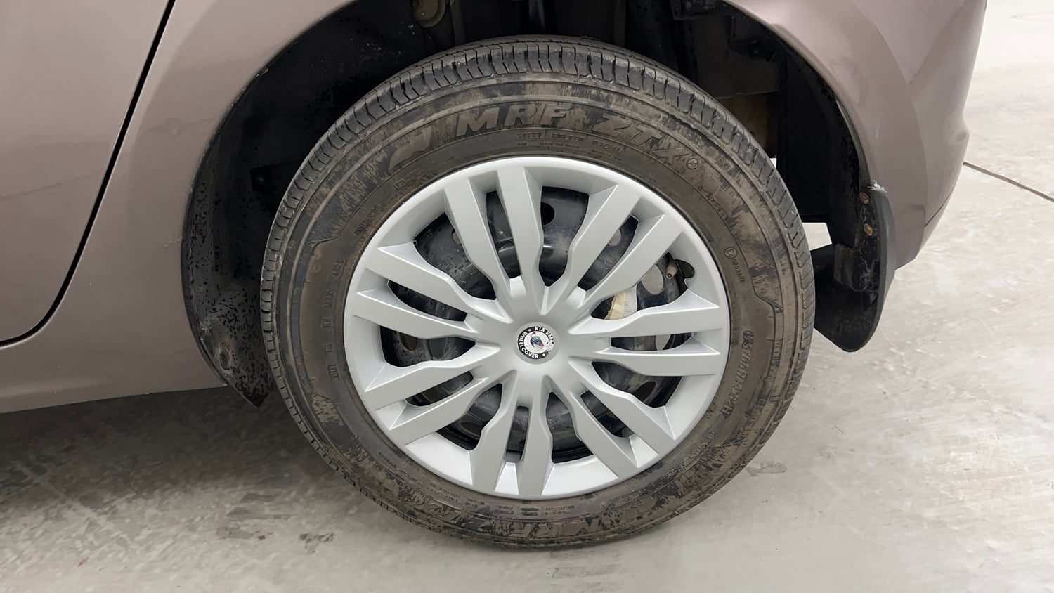 Used 2017 Tata Tiago Revotron XT Petrol Manual tyres LEFT REAR TYRE RIM VIEW