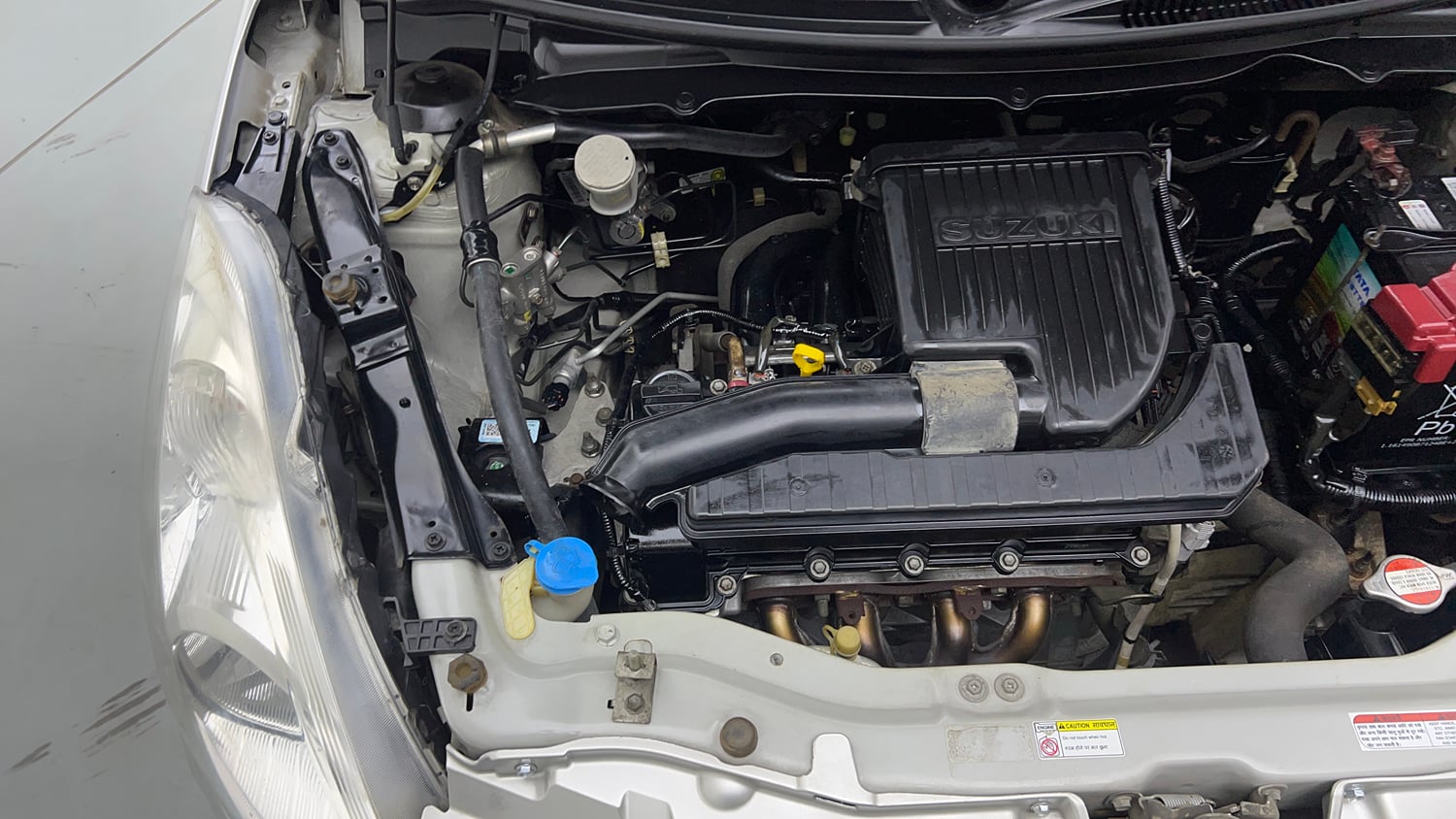 Used 2015 Maruti Suzuki Swift Lxi (O) Petrol Manual engine ENGINE RIGHT SIDE VIEW