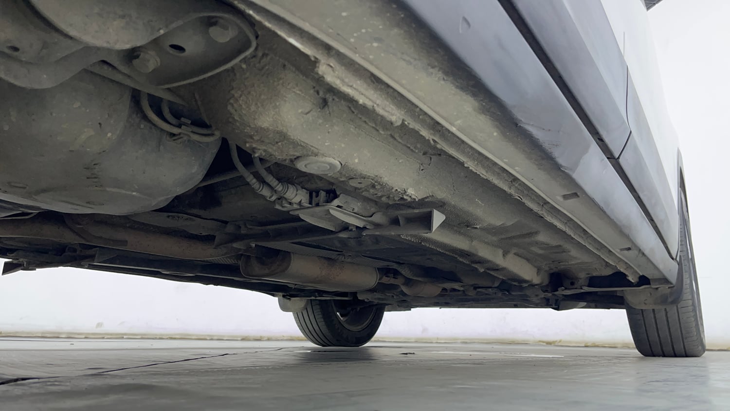 Used 2022 Volkswagen Taigun Topline 1.0 TSI AT Petrol Automatic extra REAR RIGHT UNDERBODY VIEW