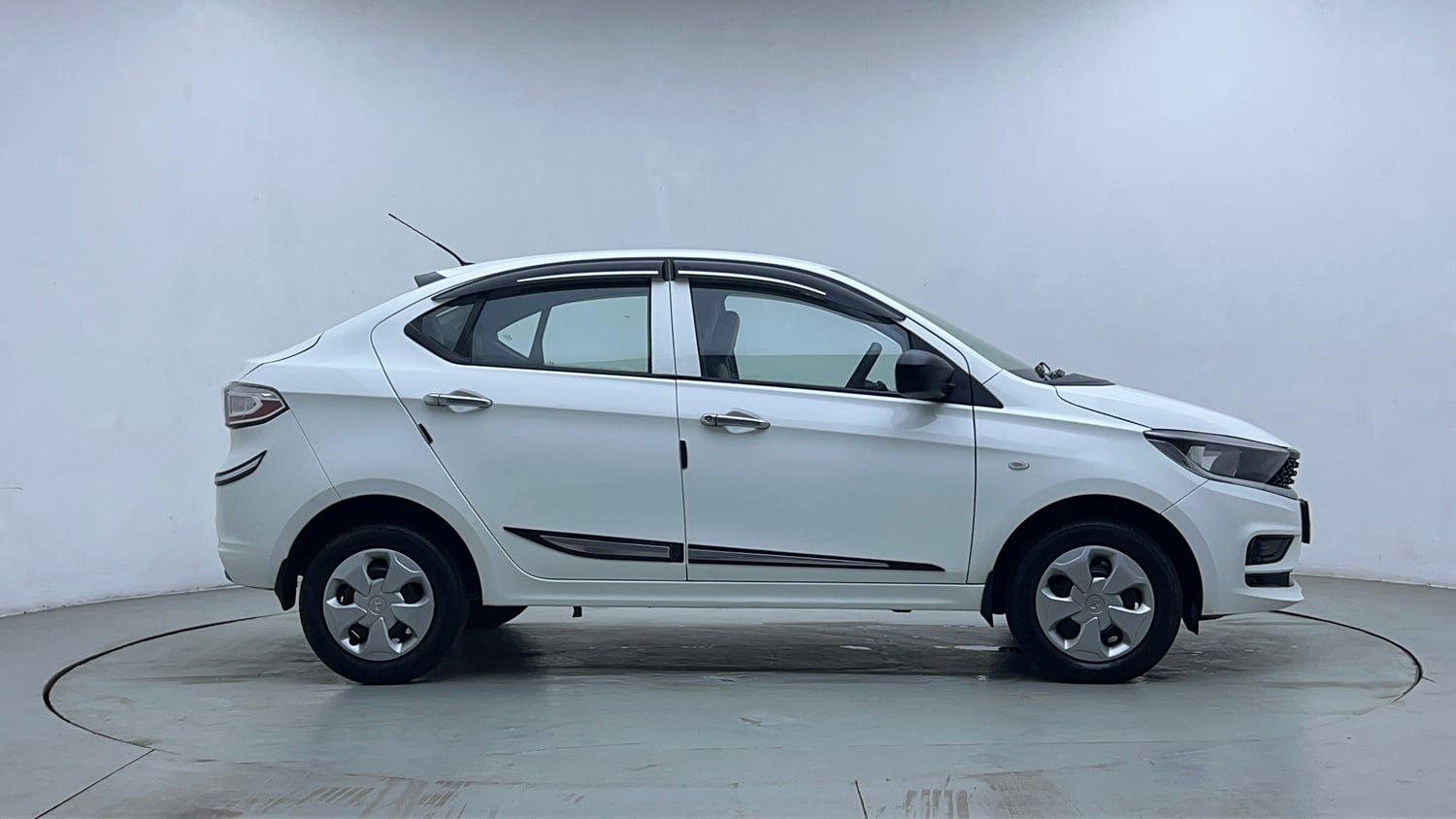 Used 2024 Tata Tigor XM Petrol Manual exterior RIGHT SIDE VIEW