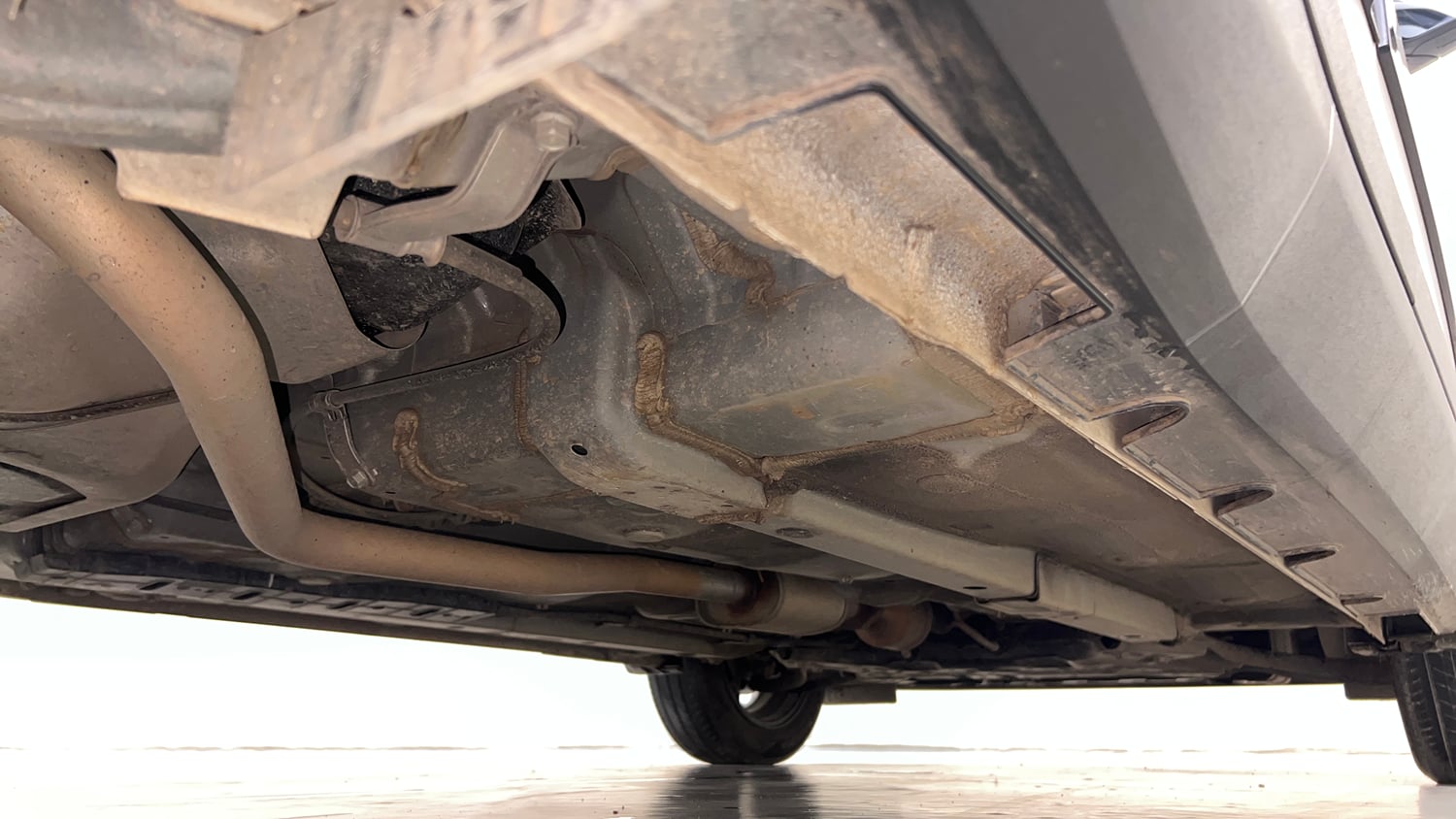 Used 2023 Hyundai Exter SX (O) Connect 1.2 AMT Petrol Automatic extra REAR RIGHT UNDERBODY VIEW