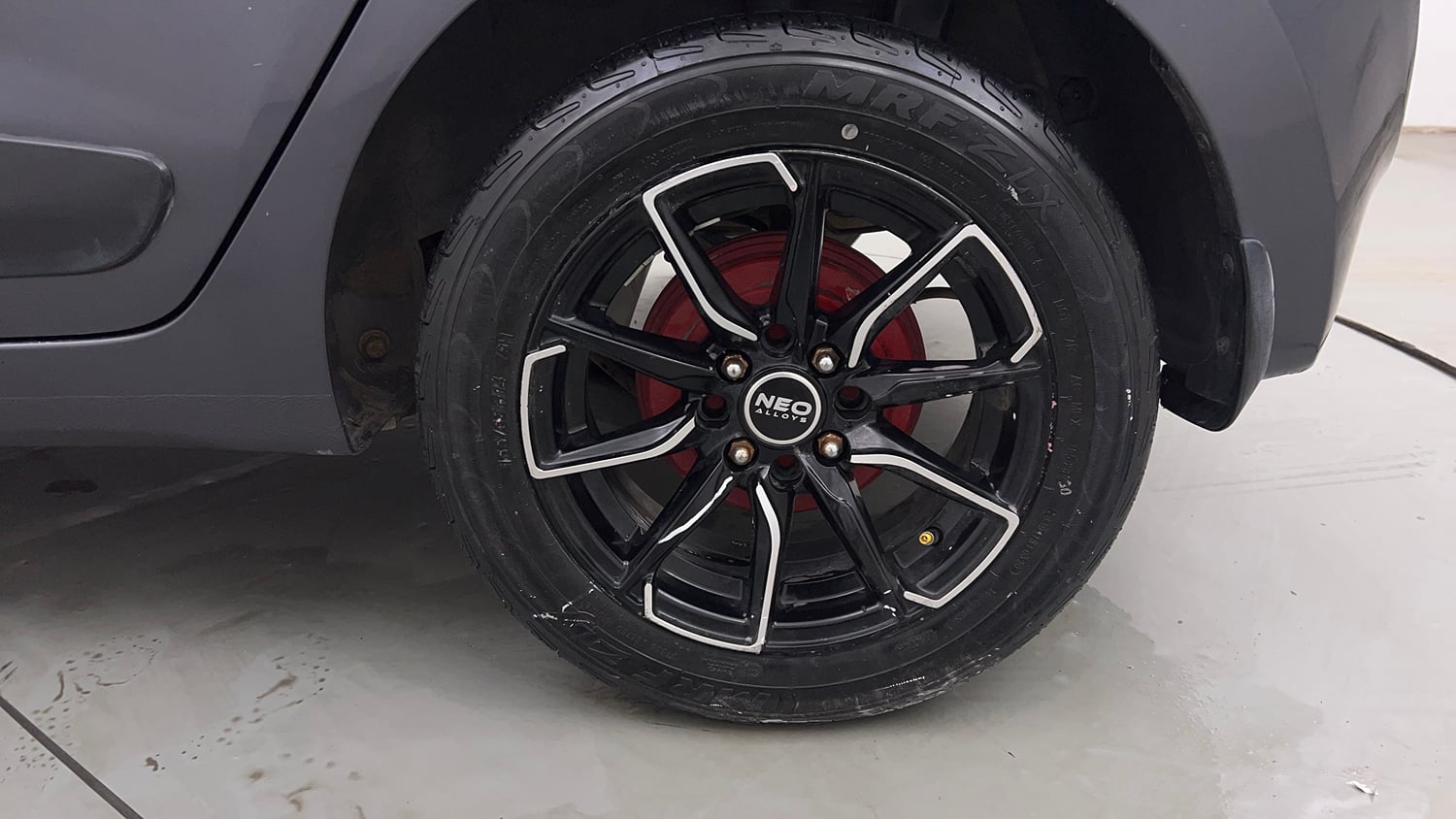 Used 2015 Hyundai Grand i10 Sportz 1.2 Kappa VTVT Petrol Manual tyres LEFT REAR TYRE RIM VIEW
