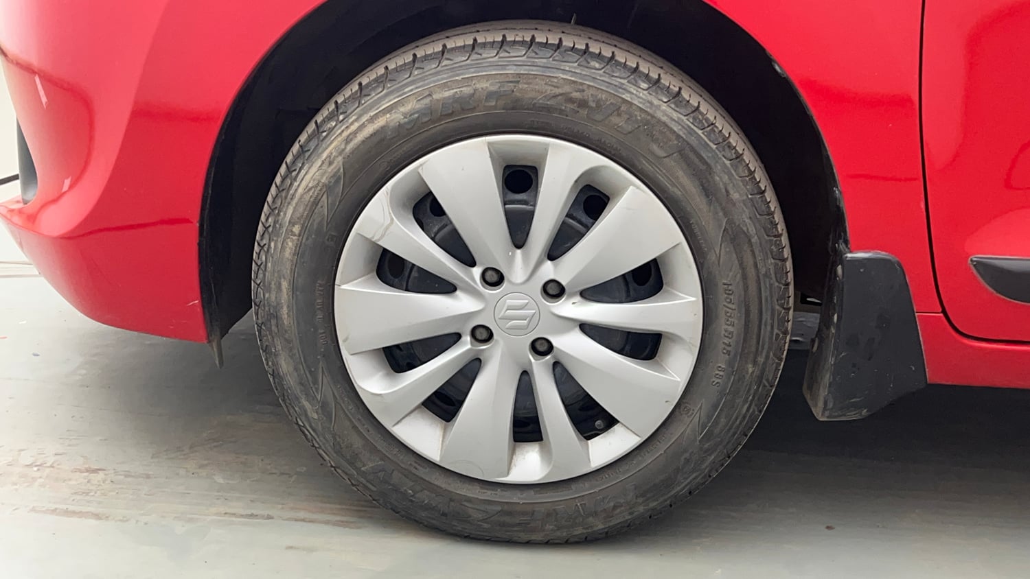 Used 2018 Maruti Suzuki Baleno Delta 1.2 Petrol Manual tyres LEFT FRONT TYRE RIM VIEW