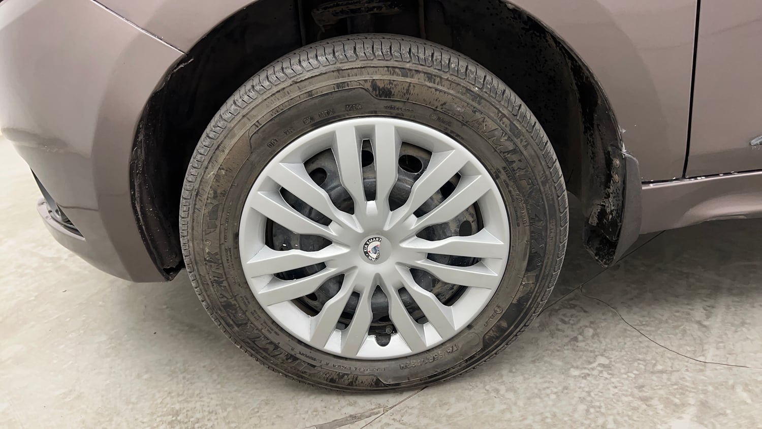 Used 2017 Tata Tiago Revotron XT Petrol Manual tyres LEFT FRONT TYRE RIM VIEW