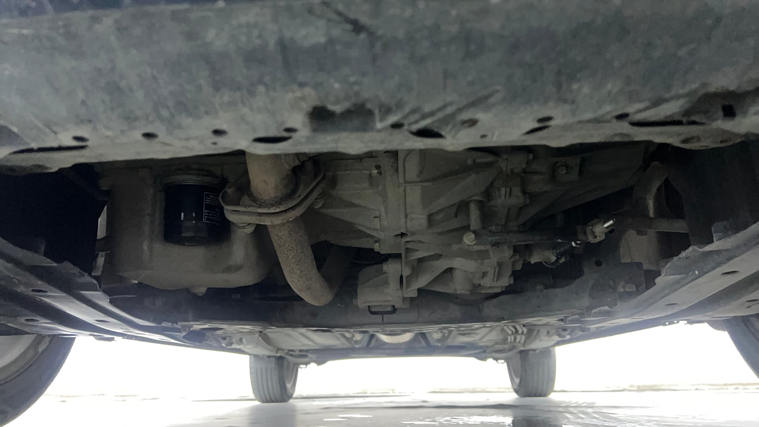 Used 2021 Maruti Suzuki Baleno Zeta Petrol Manual extra FRONT LEFT UNDERBODY VIEW