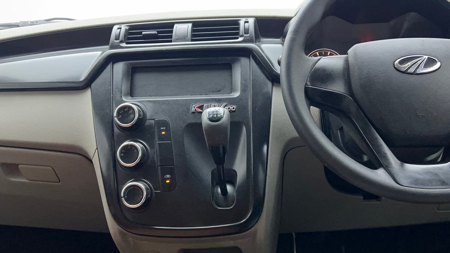 Used 2017 Mahindra KUV100 K4 6 STR Petrol Manual interior MUSIC SYSTEM & AC CONTROL VIEW
