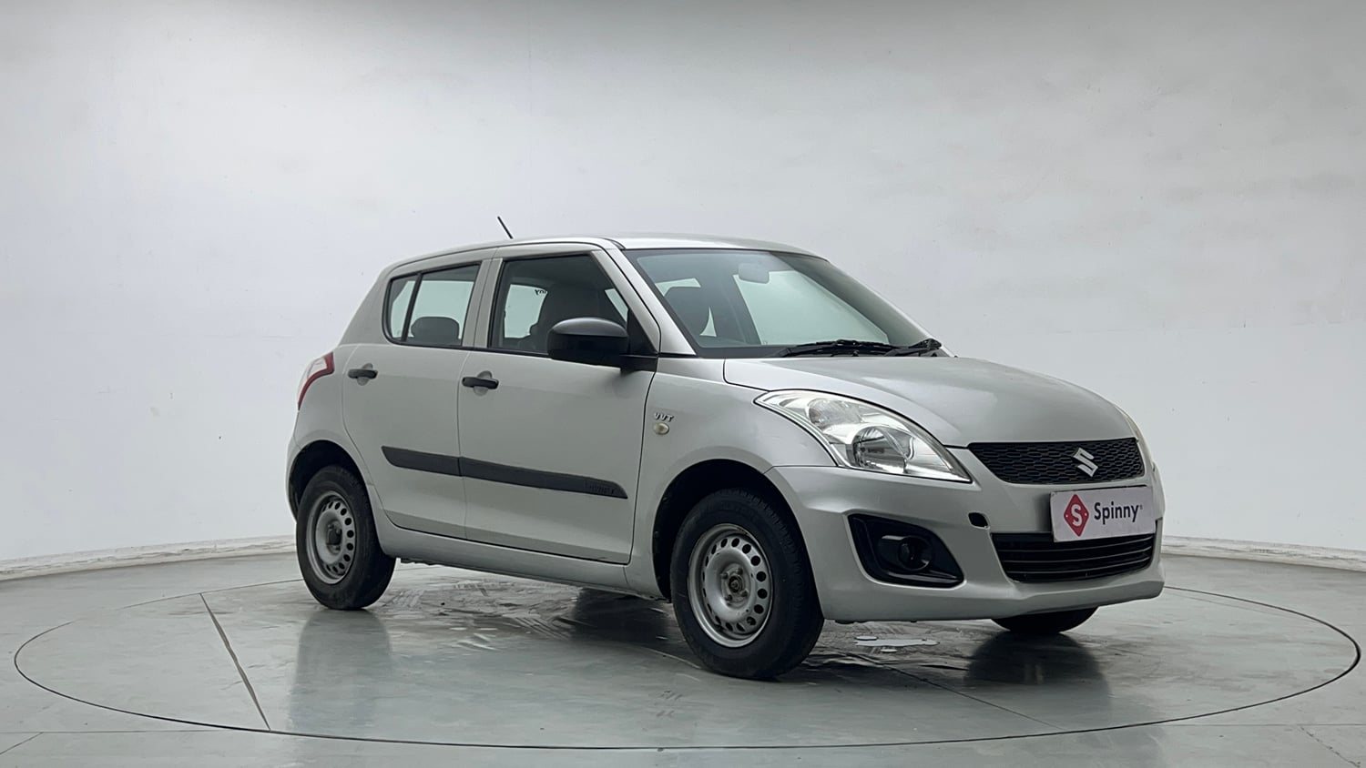 Used 2015 Maruti Suzuki Swift Lxi (O) Petrol Manual exterior RIGHT FRONT CORNER VIEW