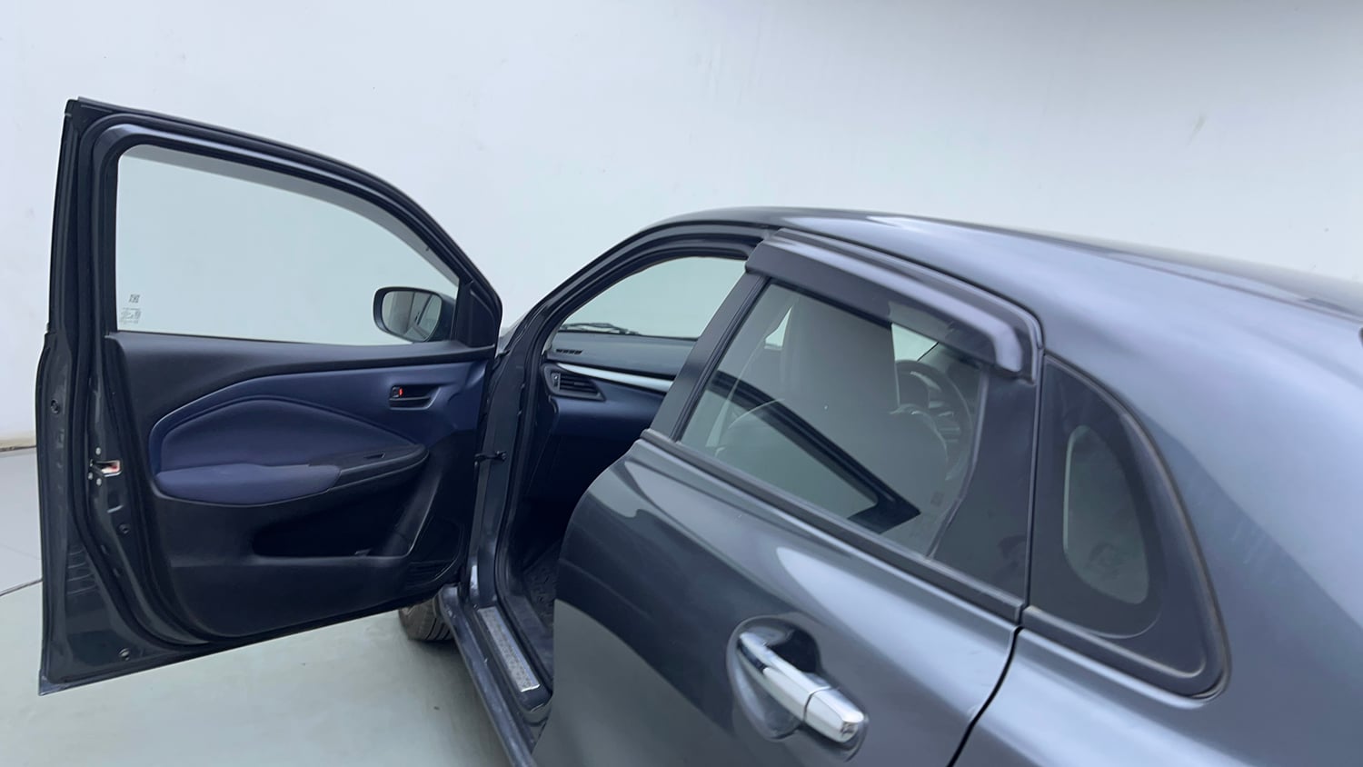 Used 2024 Maruti Suzuki Baleno Delta MT Petrol Manual interior LEFT FRONT DOOR OPEN VIEW