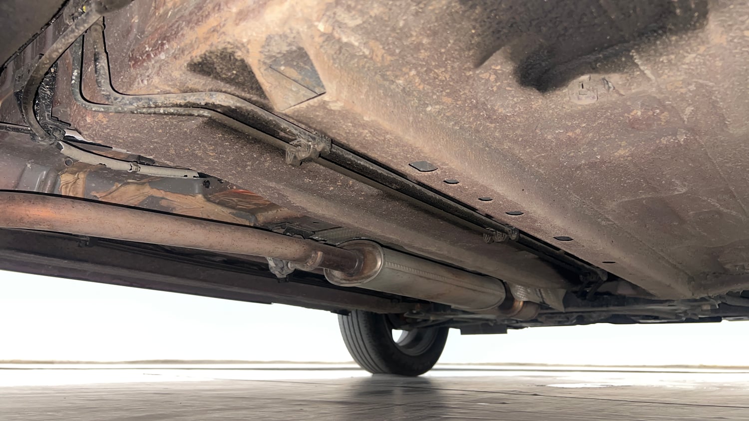 Used 2023 Nissan Magnite XV Turbo CVT Petrol Automatic extra REAR RIGHT UNDERBODY VIEW