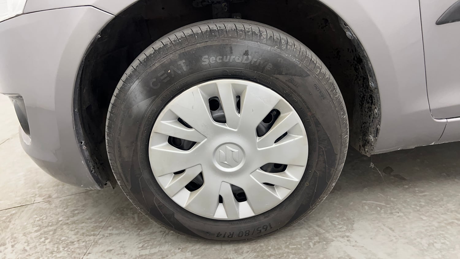 Used 2014 Maruti Suzuki Swift VXi Petrol Manual tyres LEFT FRONT TYRE RIM VIEW