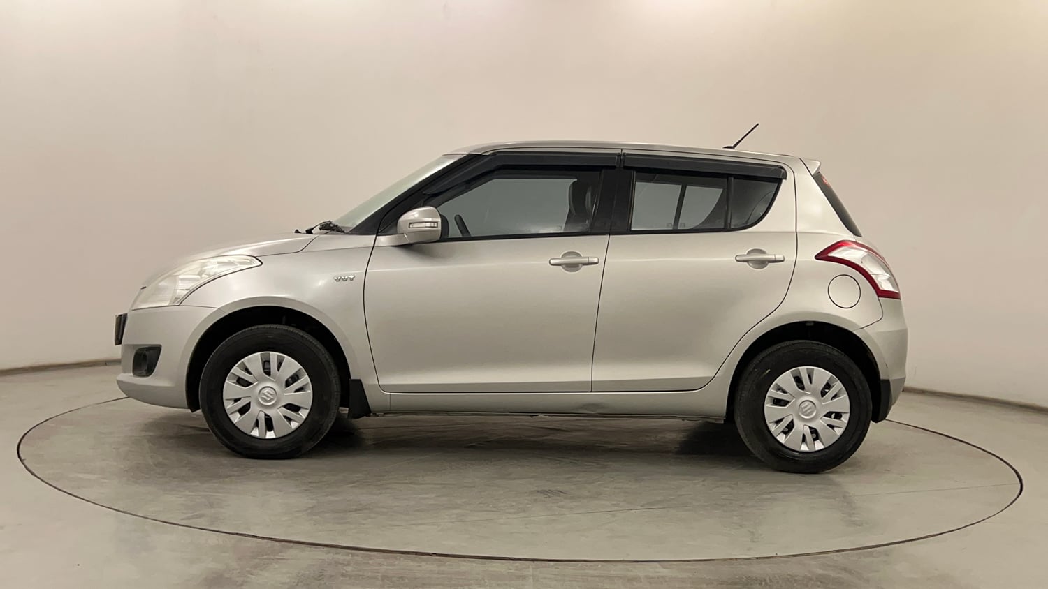 Used 2013 Maruti Suzuki Swift VXi Petrol Manual exterior LEFT SIDE VIEW