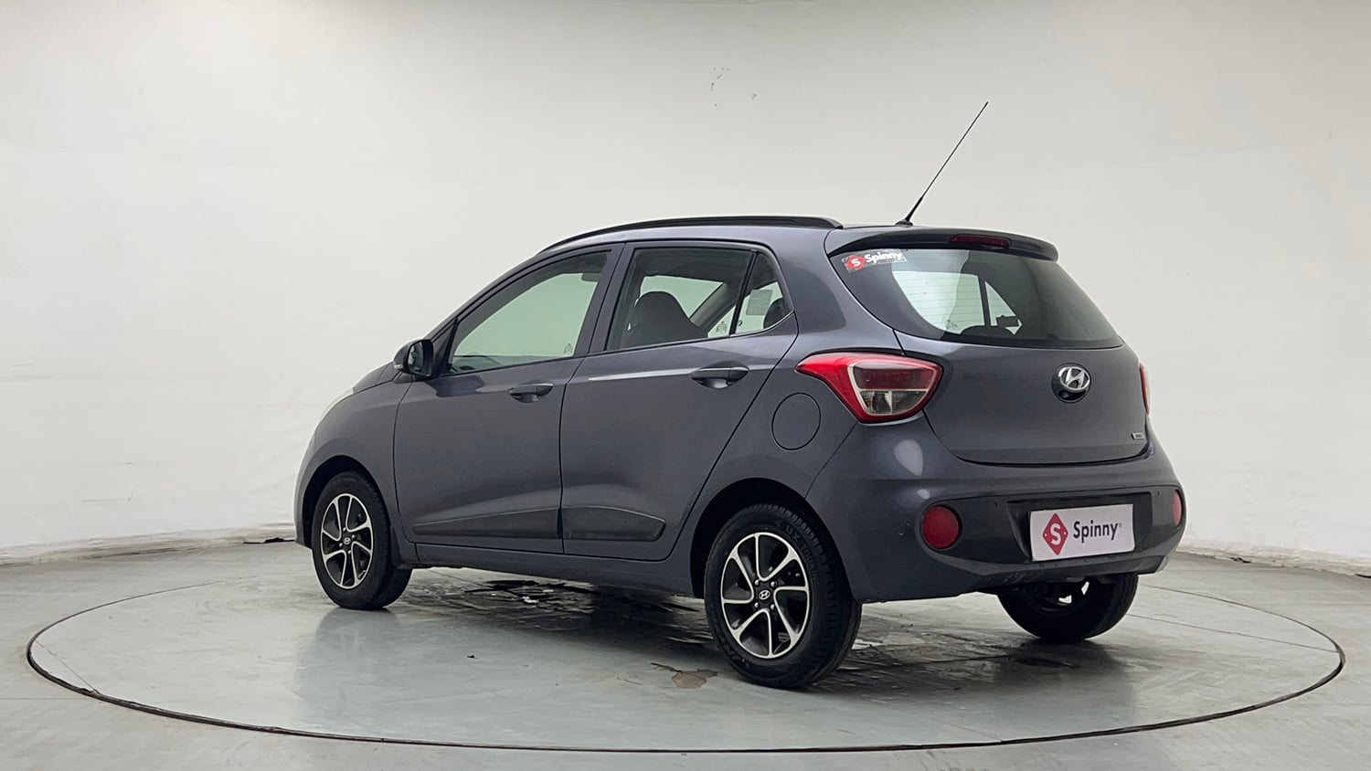 Used 2017 Hyundai Grand i10 Sportz (O) AT 1.2 Kappa VTVT Petrol Automatic exterior LEFT REAR CORNER VIEW