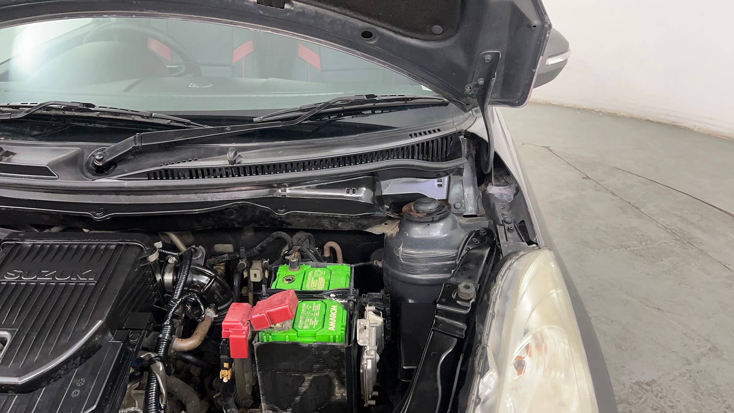 Used 2014 Maruti Suzuki Swift VXi Petrol Manual engine ENGINE LEFT SIDE HINGE & APRON VIEW