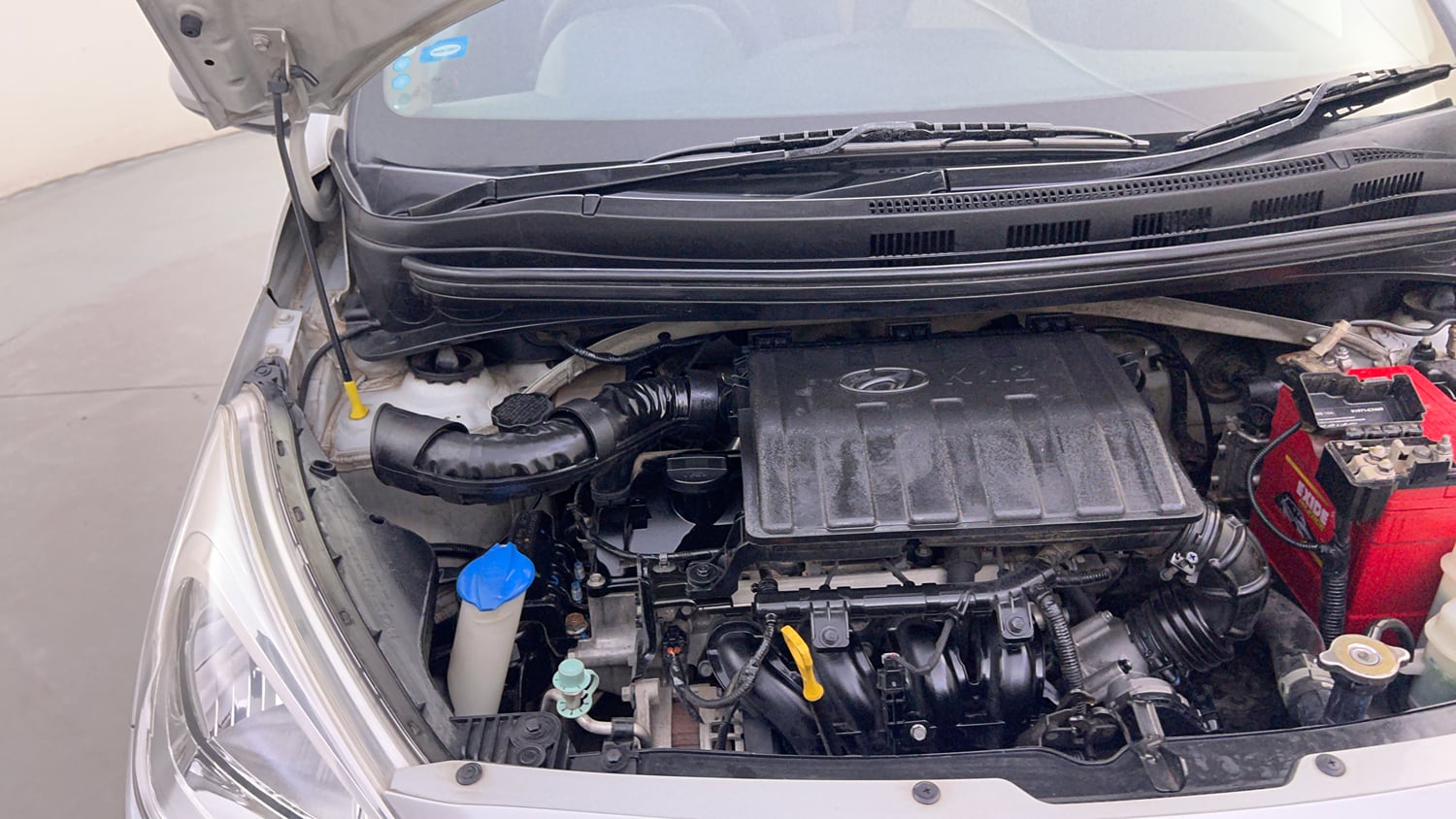 Used 2018 Hyundai Grand i10 Magna 1.2 Kappa VTVT Petrol Manual engine ENGINE RIGHT SIDE HINGE & APRON VIEW