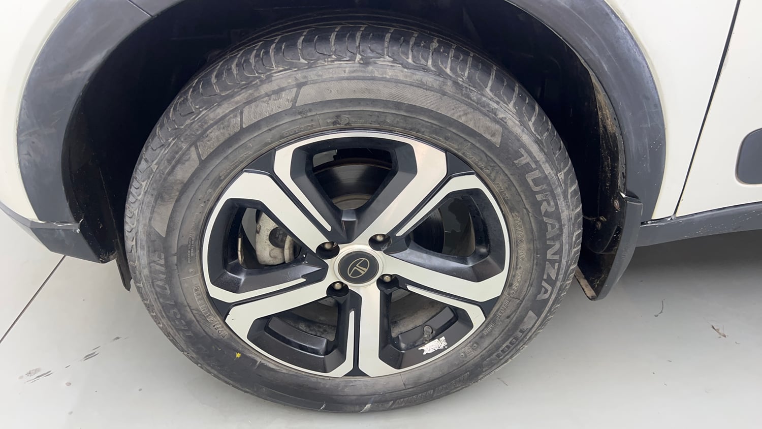 Used 2023 Tata Nexon XZ Plus (S) Petrol Manual tyres LEFT FRONT TYRE RIM VIEW