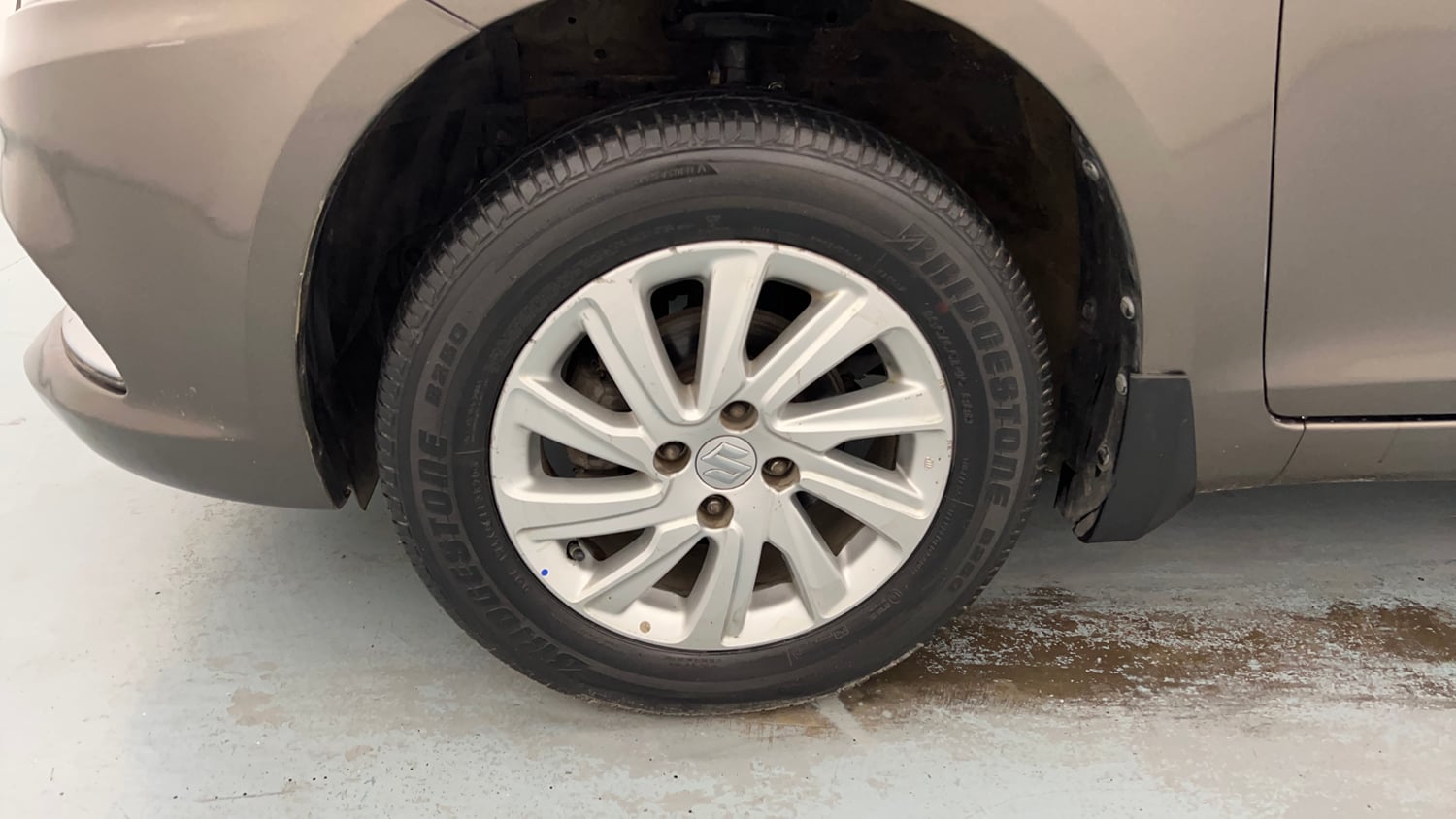 Used 2016 Maruti Suzuki Swift Dzire ZXI Petrol Manual tyres LEFT FRONT TYRE RIM VIEW