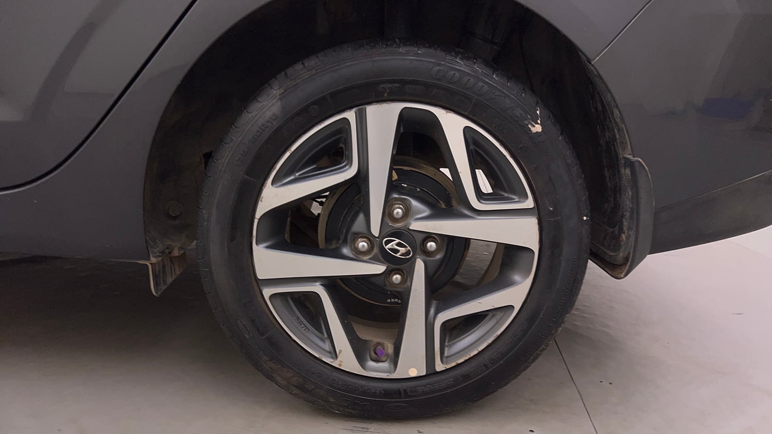 Used 2020 Hyundai Aura SX 1.2 (O) Petrol Petrol Manual tyres LEFT REAR TYRE RIM VIEW