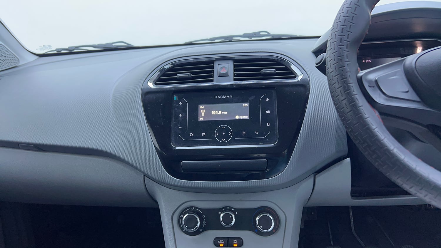 Used 2024 Tata Tigor XM Petrol Manual interior MUSIC SYSTEM & AC CONTROL VIEW