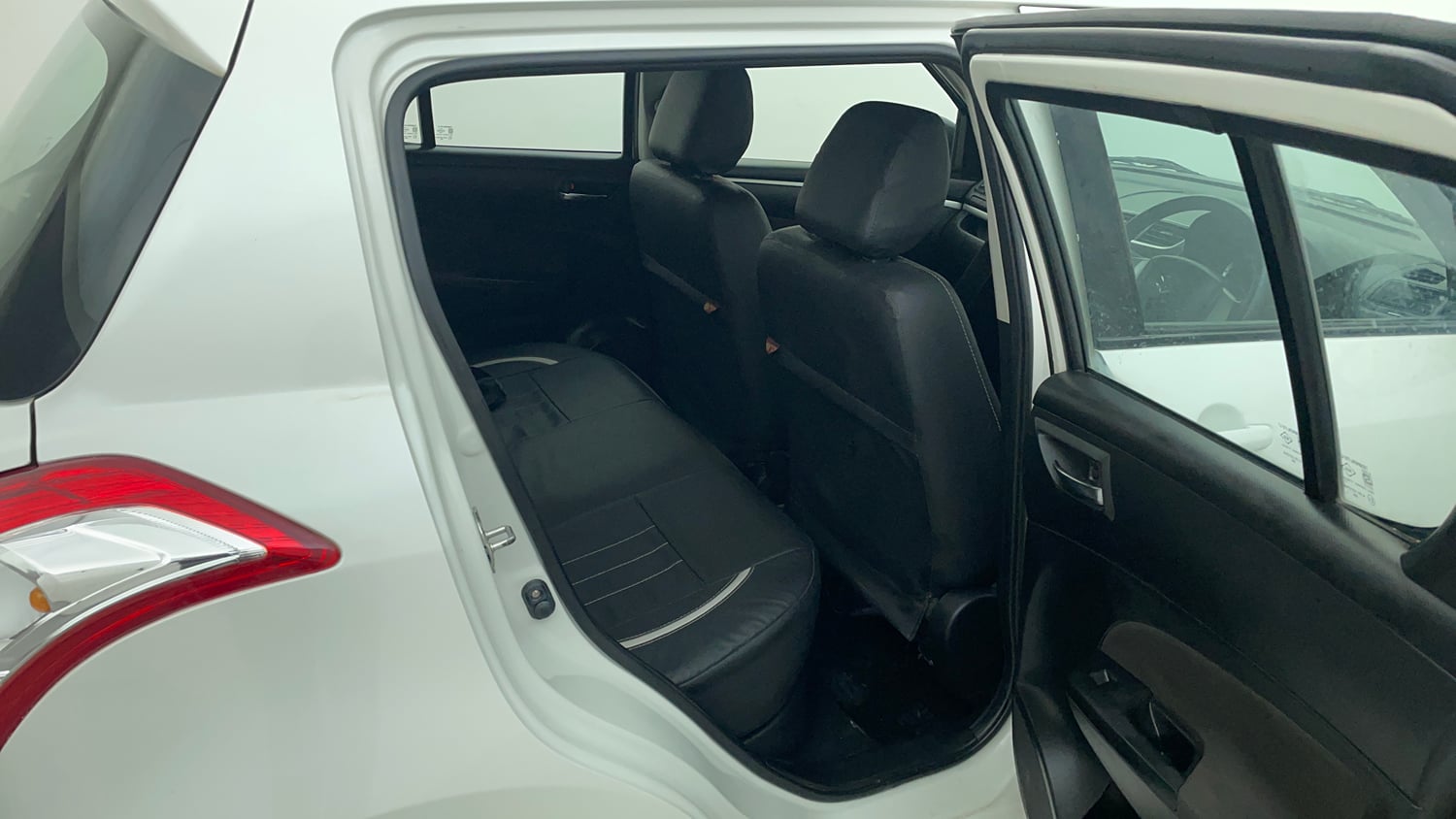 Used 2017 Maruti Suzuki Swift VXI (O) Petrol Manual interior RIGHT SIDE REAR DOOR CABIN VIEW