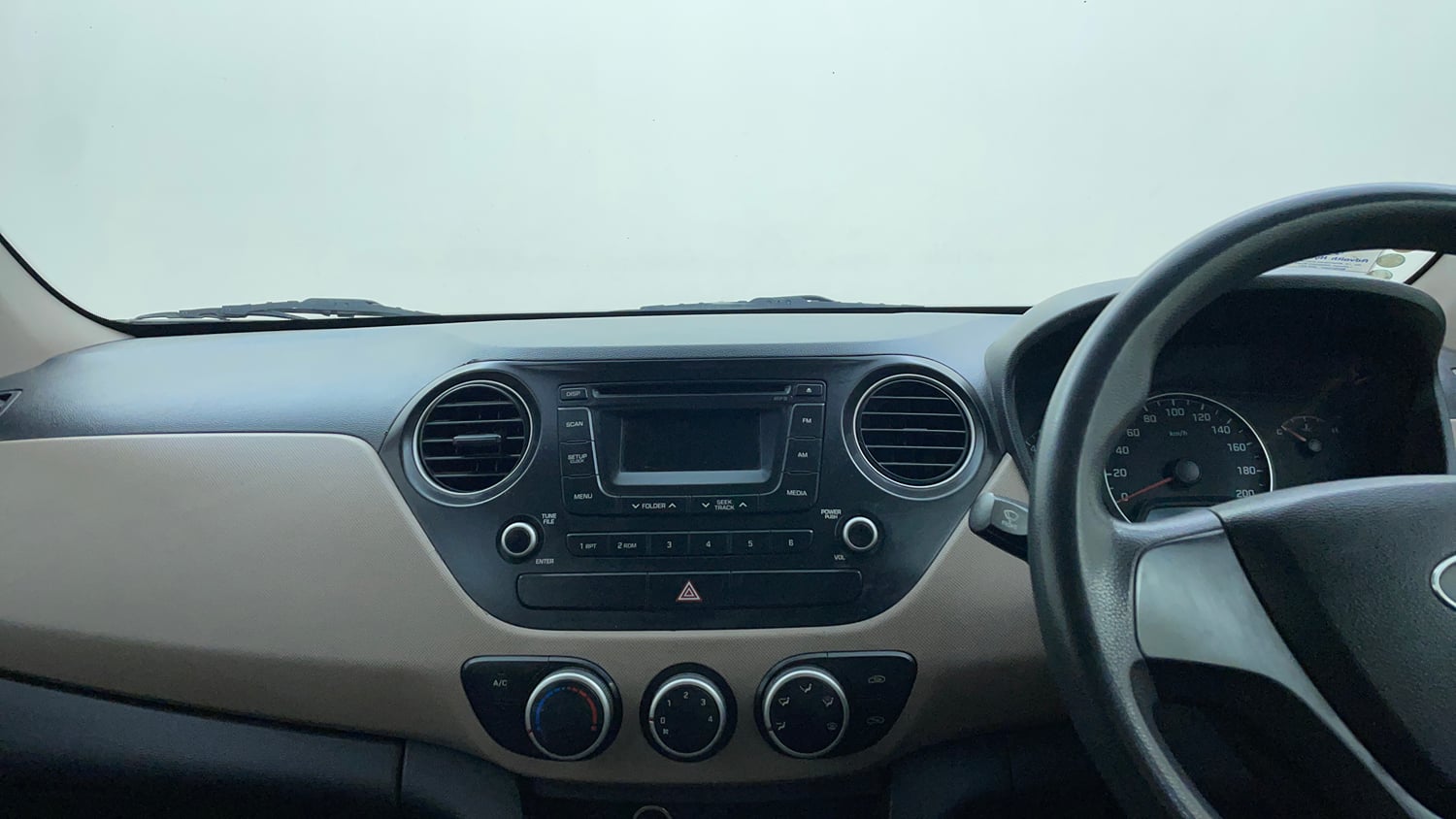 Used 2013 Hyundai Grand i10 Sportz 1.2 Kappa VTVT Petrol Manual interior MUSIC SYSTEM & AC CONTROL VIEW