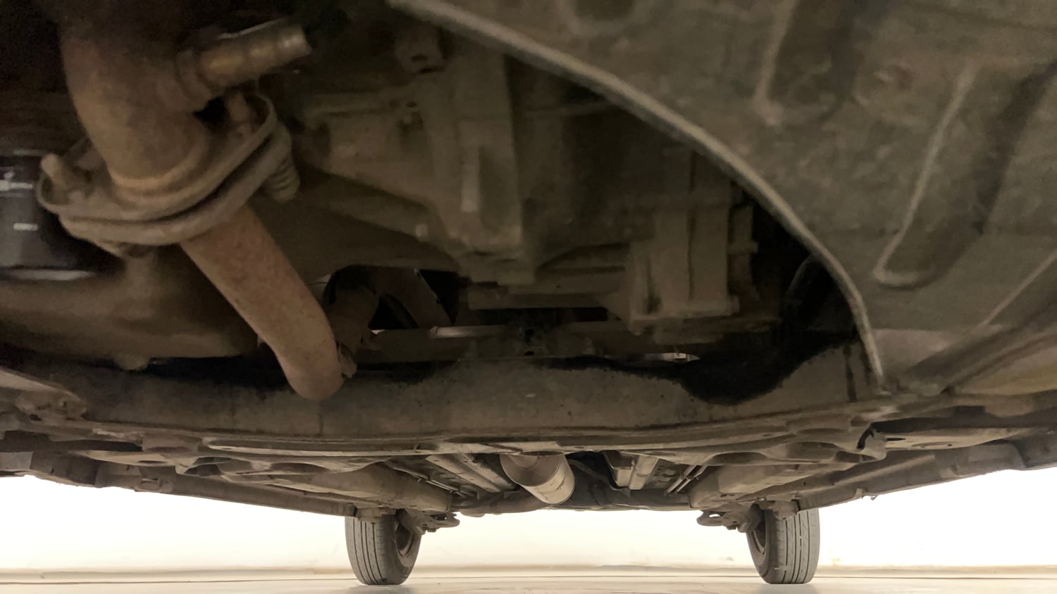 Used 2013 Maruti Suzuki Swift VXi Petrol Manual extra FRONT LEFT UNDERBODY VIEW
