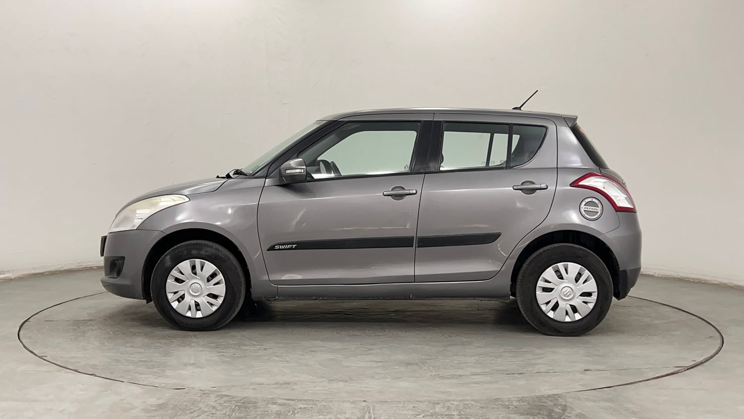 Used 2014 Maruti Suzuki Swift VXi Petrol Manual exterior LEFT SIDE VIEW