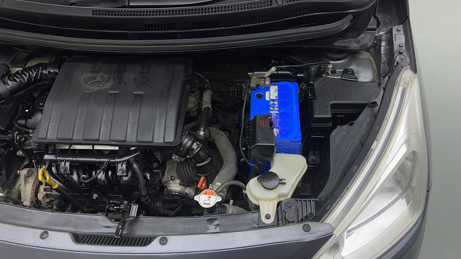 Used 2017 Hyundai Grand i10 Sportz (O) AT 1.2 Kappa VTVT Petrol Automatic engine ENGINE LEFT SIDE VIEW
