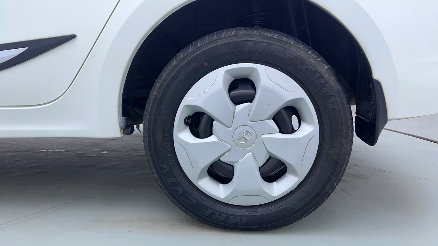 Used 2024 Tata Tigor XM Petrol Manual tyres LEFT REAR TYRE RIM VIEW