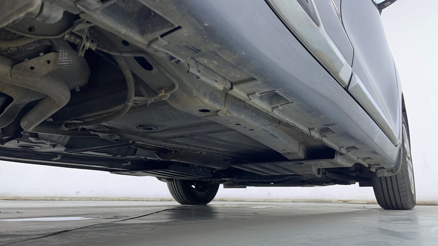 Used 2024 Maruti Suzuki Baleno Delta MT Petrol Manual extra REAR RIGHT UNDERBODY VIEW