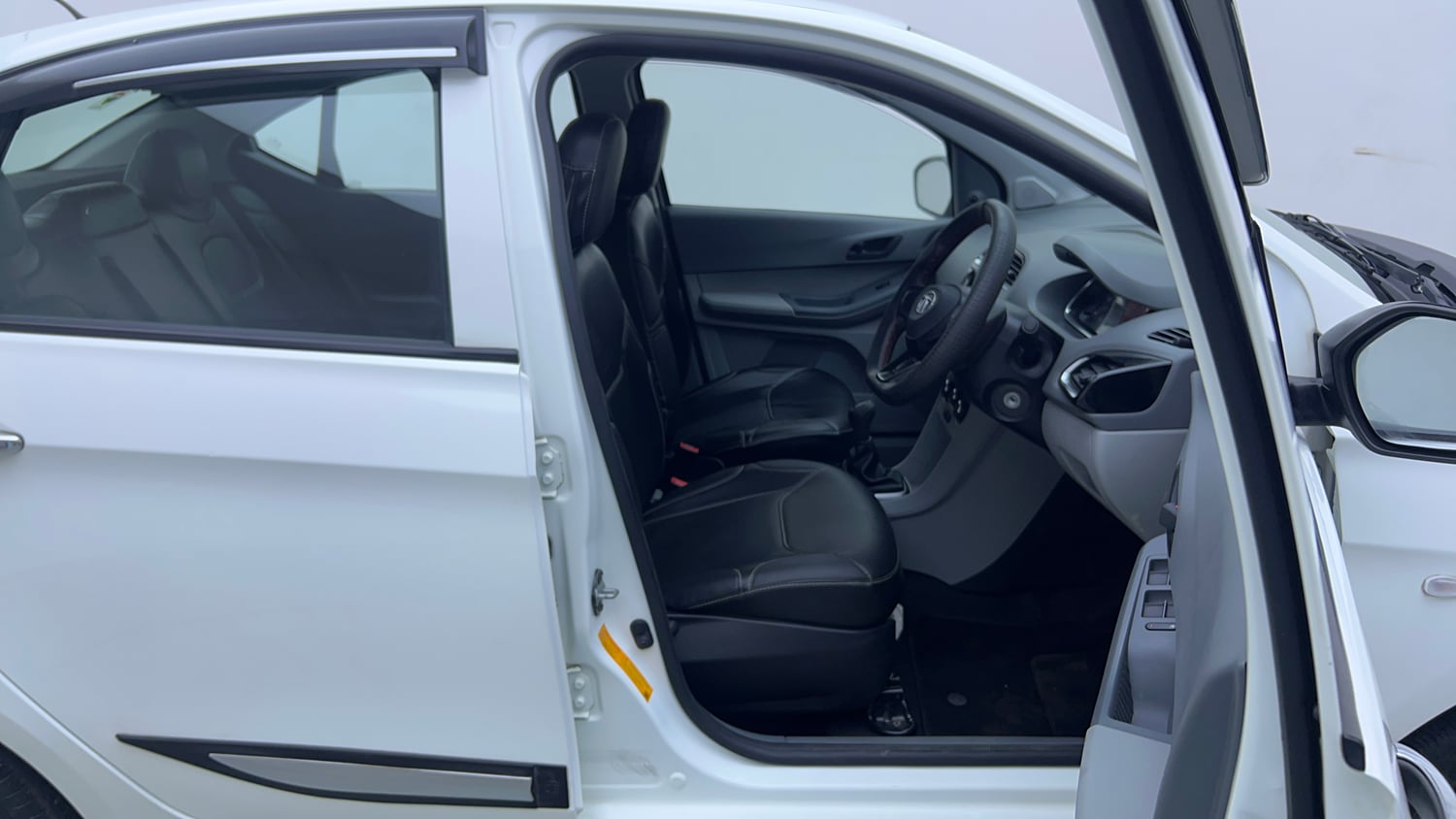 Used 2024 Tata Tigor XM Petrol Manual interior RIGHT SIDE FRONT DOOR CABIN VIEW