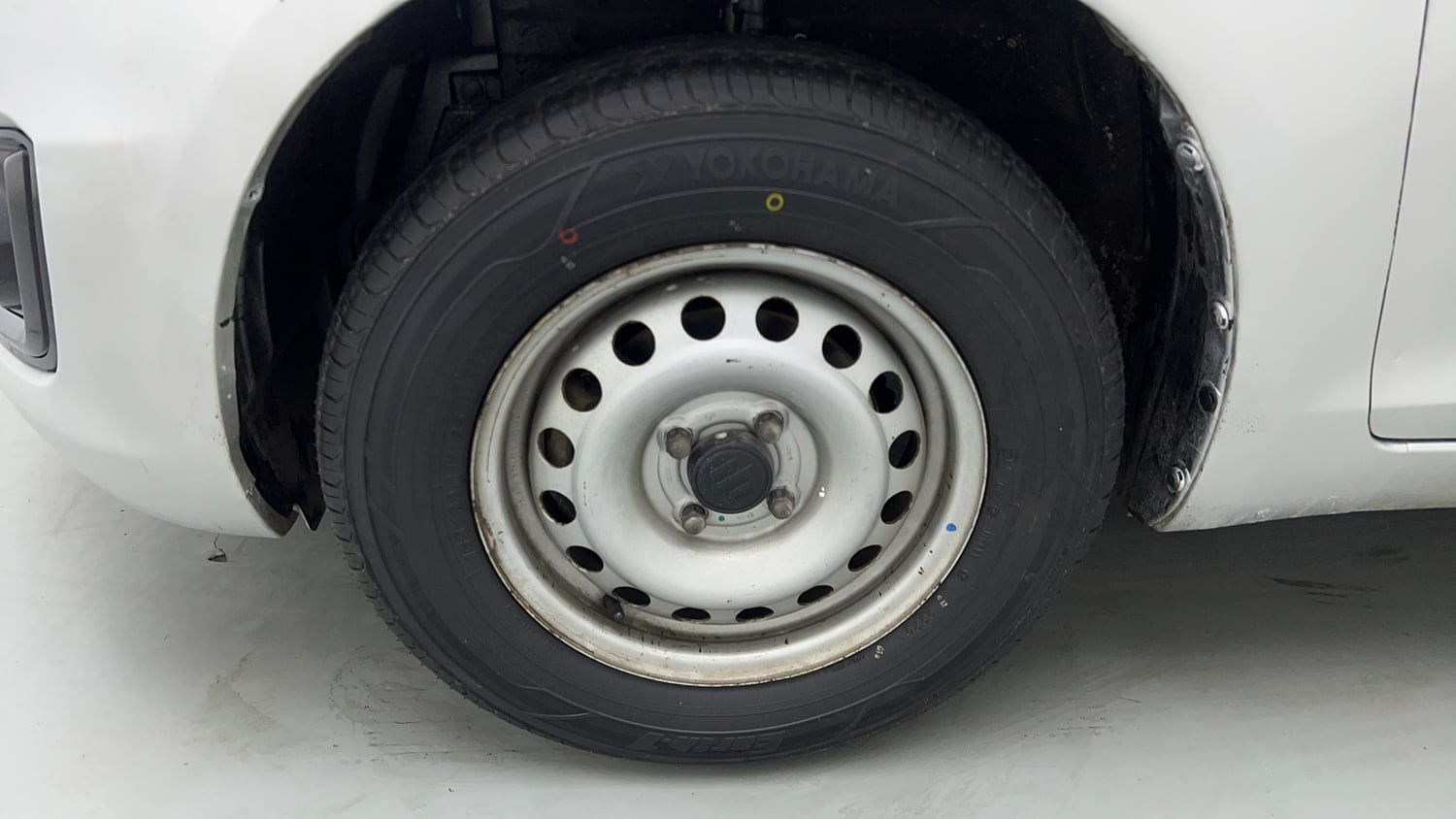 Used 2015 Maruti Suzuki Swift Lxi (O) Petrol Manual tyres LEFT FRONT TYRE RIM VIEW
