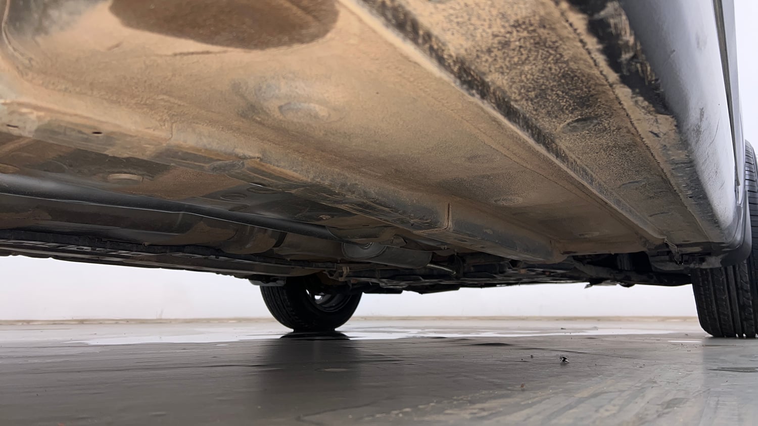 Used 2015 Hyundai Grand i10 Sportz 1.2 Kappa VTVT Petrol Manual extra REAR RIGHT UNDERBODY VIEW
