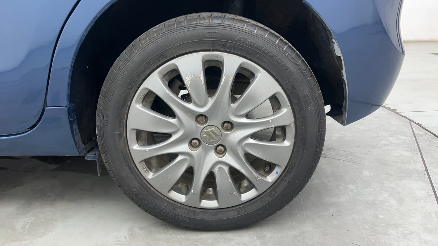 Used 2016 Maruti Suzuki Baleno Zeta 1.2 Petrol Manual tyres LEFT REAR TYRE RIM VIEW