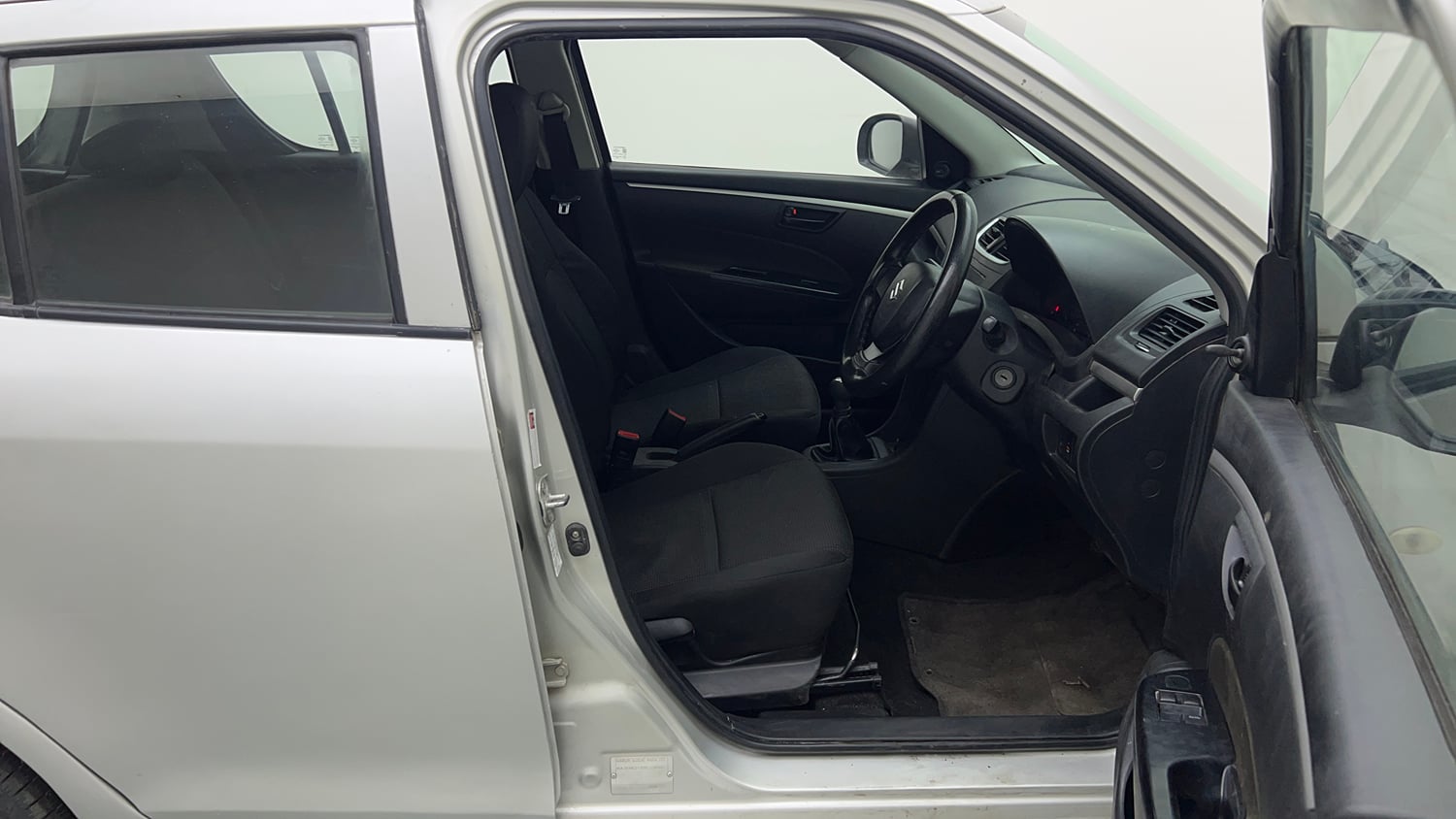 Used 2017 Maruti Suzuki Swift Lxi (O) Petrol Manual interior RIGHT SIDE FRONT DOOR CABIN VIEW
