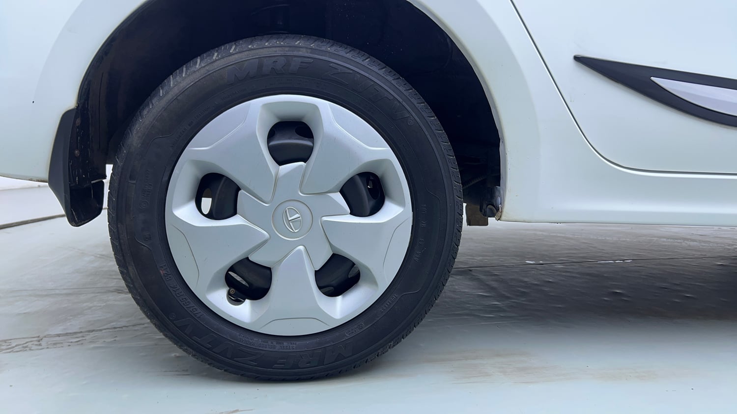 Used 2024 Tata Tigor XM Petrol Manual tyres RIGHT REAR TYRE RIM VIEW