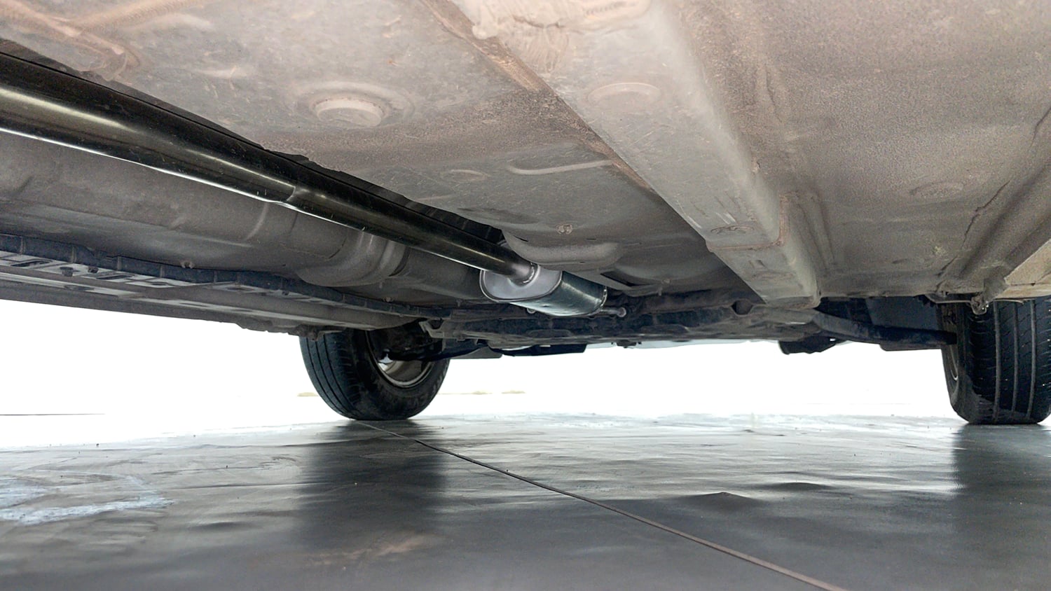 Used 2014 Hyundai Xcent S 1.2 (O) Petrol Manual extra REAR RIGHT UNDERBODY VIEW