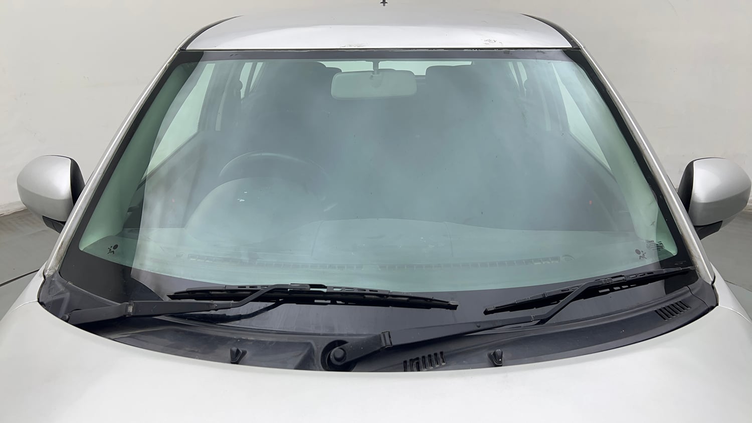 Used 2017 Maruti Suzuki Swift Lxi (O) Petrol Manual exterior FRONT WINDSHIELD VIEW