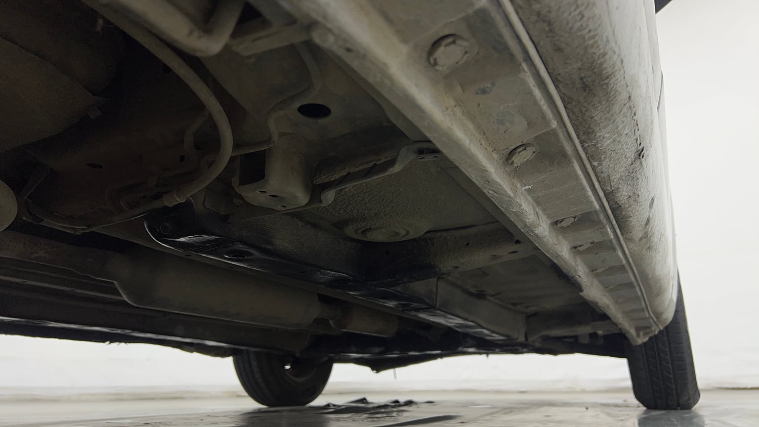 Used 2017 Maruti Suzuki Swift Lxi (O) Petrol Manual extra REAR RIGHT UNDERBODY VIEW