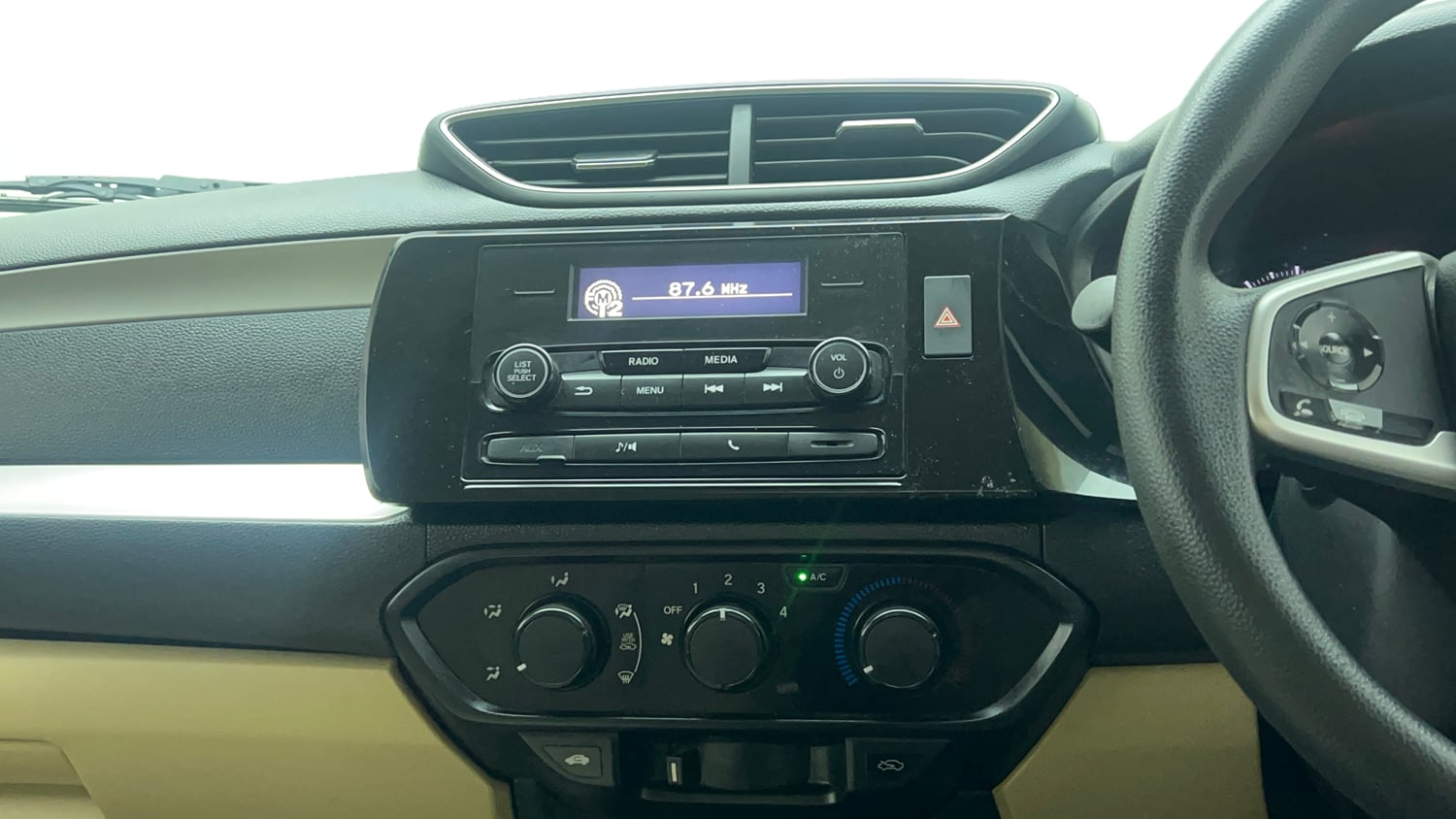 Used 2022 Honda Amaze S MT 1.2 Petrol Petrol Manual top_features Integrated (in-dash) music system